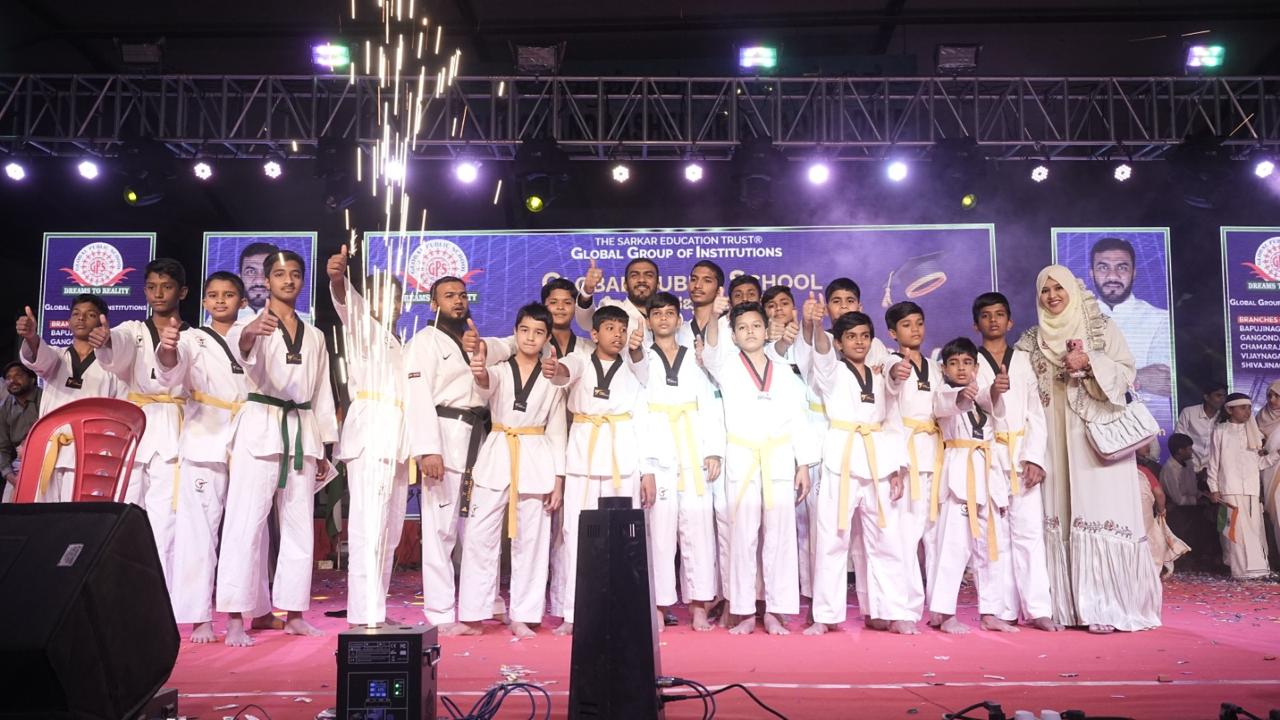 Taekwondo students celebrating at the annual function