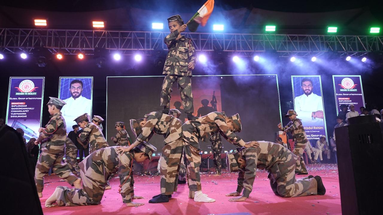 Children perform a patriotic pyramid act