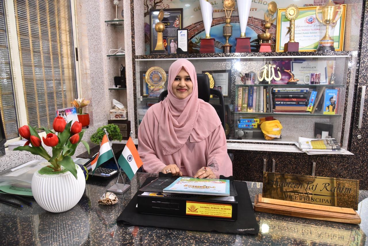 School director seated at her office desk