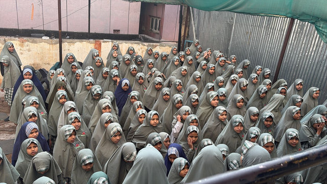 Young students gathered in the schoolyard