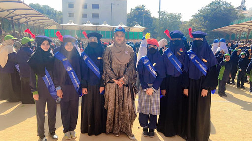 Students with sashes at an event